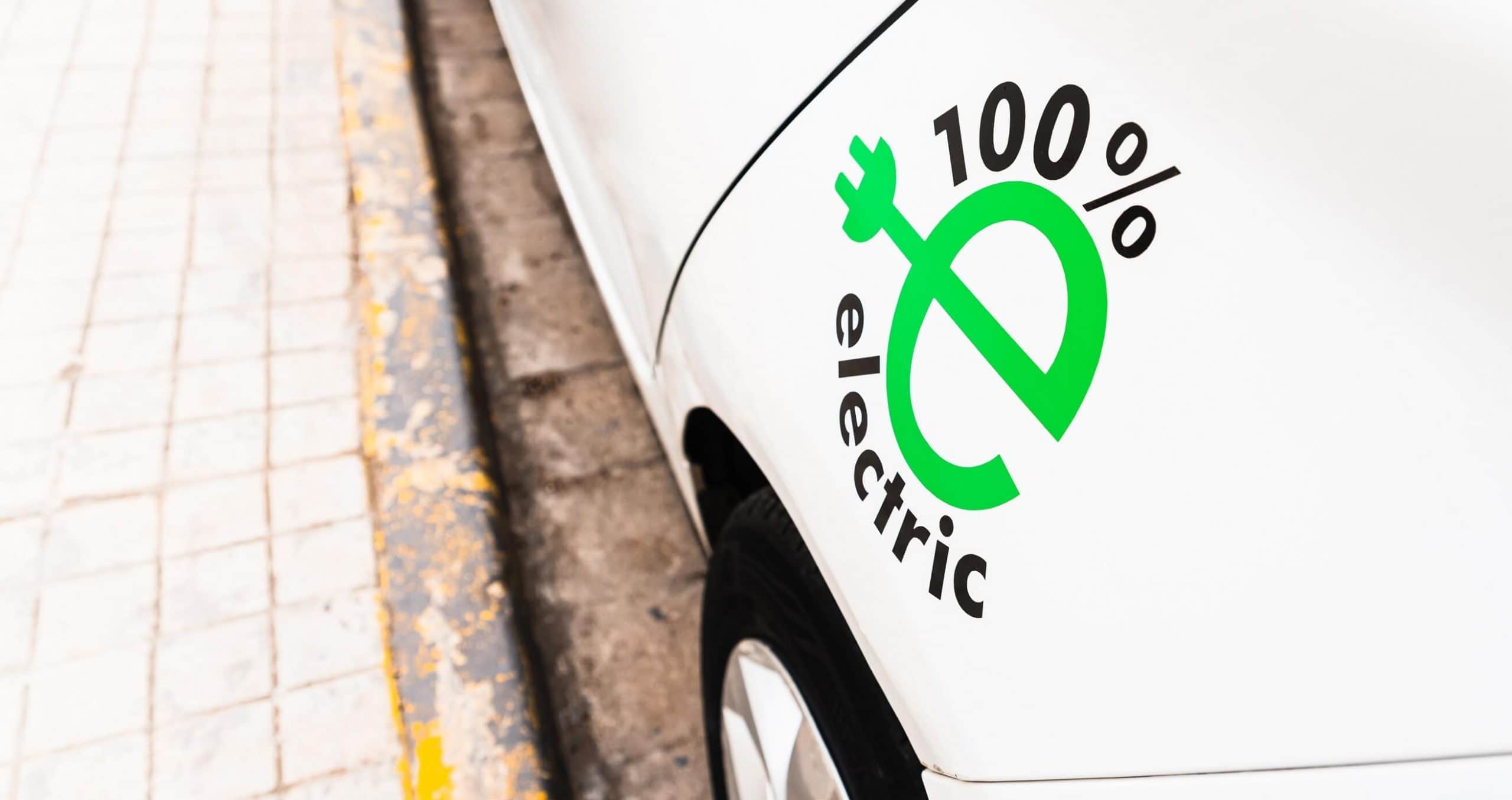 100 electric white car promotion of sustainable 2022 05 03 12 08 58 utc 2 1 scaled